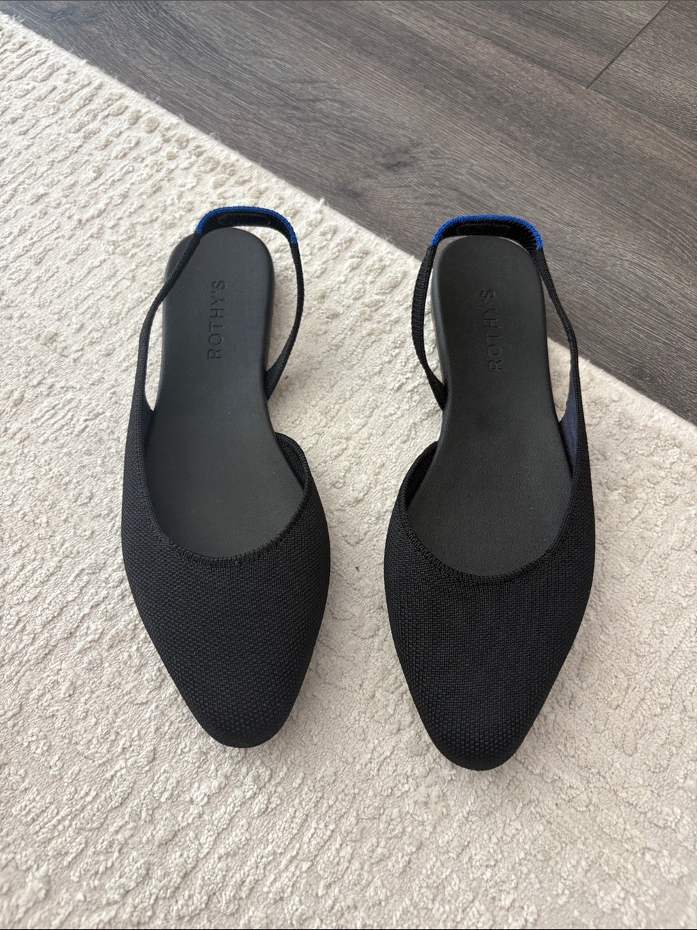 Rothy's Black Pointed Slingback Flats with Blue Heel Accent